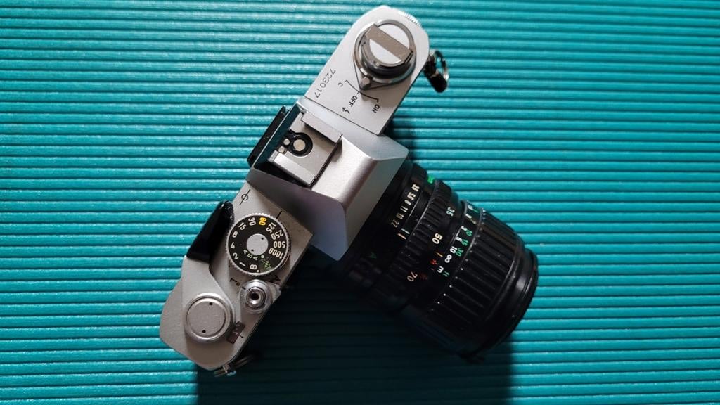 Canon FTb, met lens canon 35-70mm, Ophalen of Verzenden, Polaroid, Canon