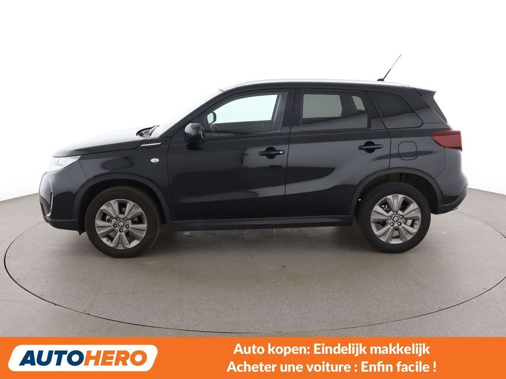 Suzuki Vitara 1.4 BoosterJet Mild-Hybrid Comfort 4x2, Auto's, Suzuki, Stof, Gebruikt, 129 g/km, Zwart