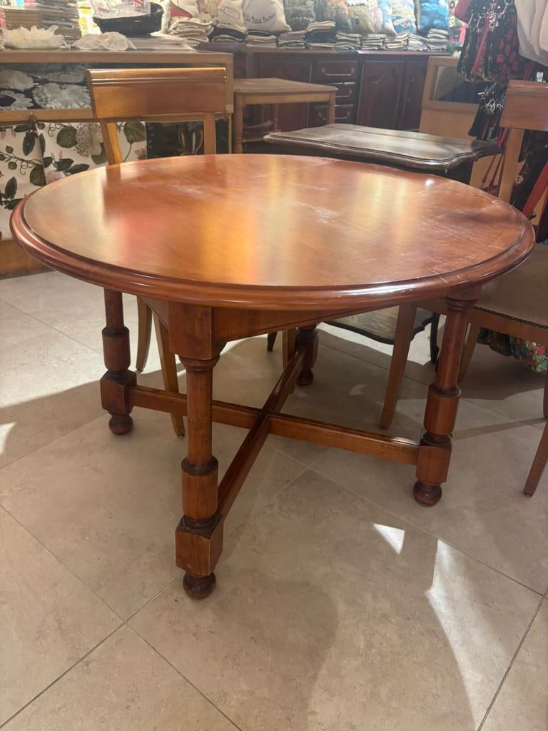 Ronde houten tafel, Ophalen