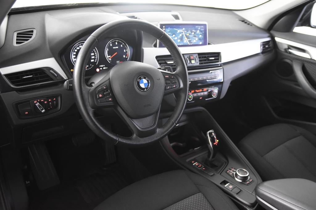 BMW X1 sDrive 16d *1ste Eigenaar*PDC*Navigatie*DAB*, Auto's, Stof, 109 g/km, Zwart, Bedrijf