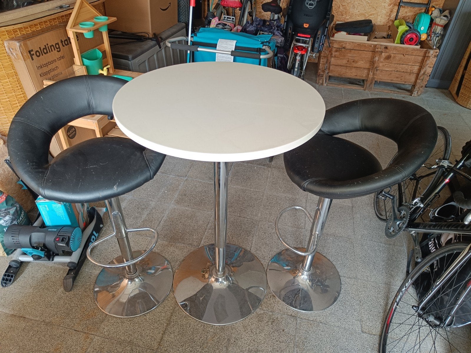 Ronde statafel met 2 leren barstoelen, Enlèvement