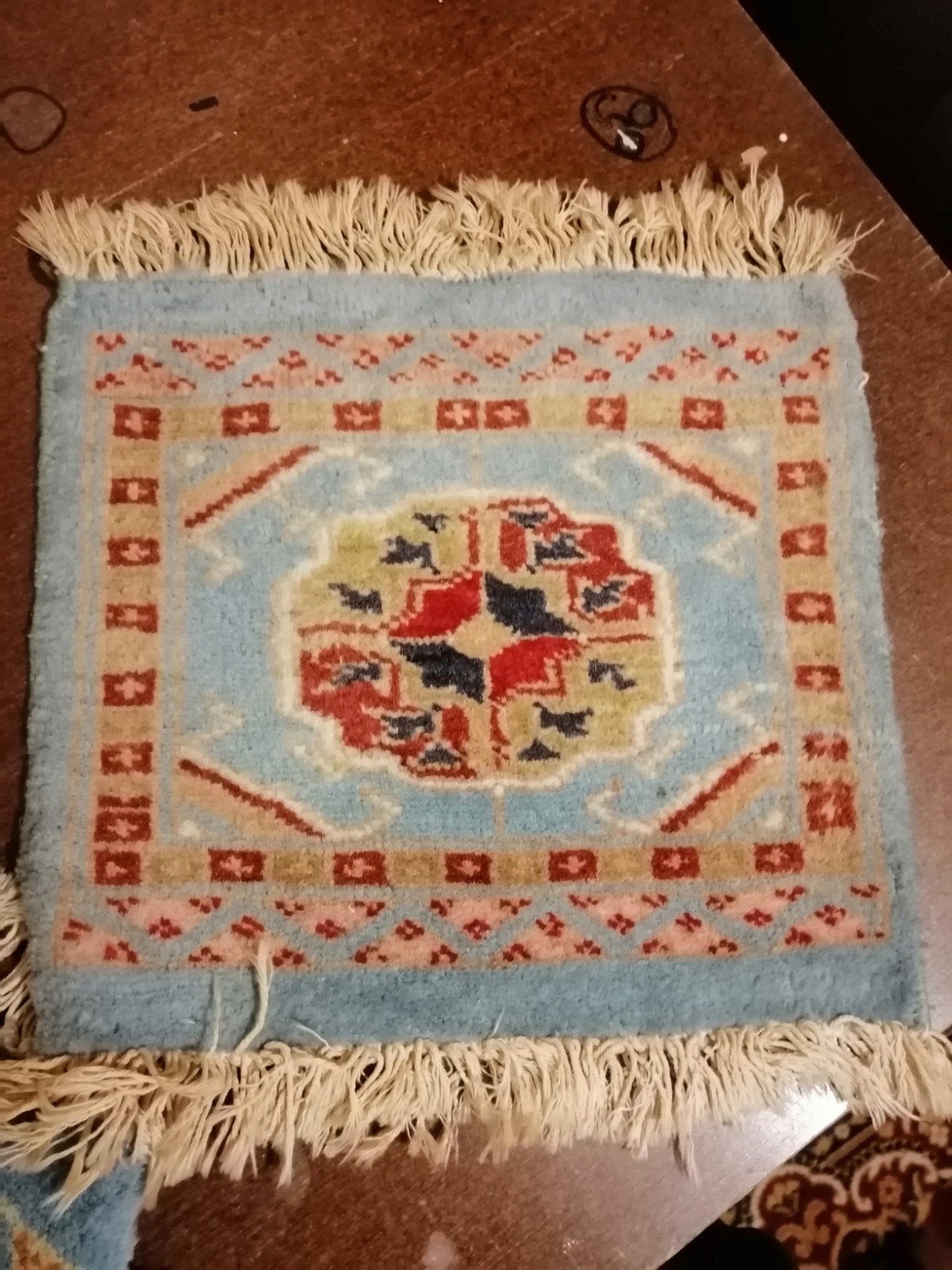 4 kleine Oosterse tapijtjes, Ophalen