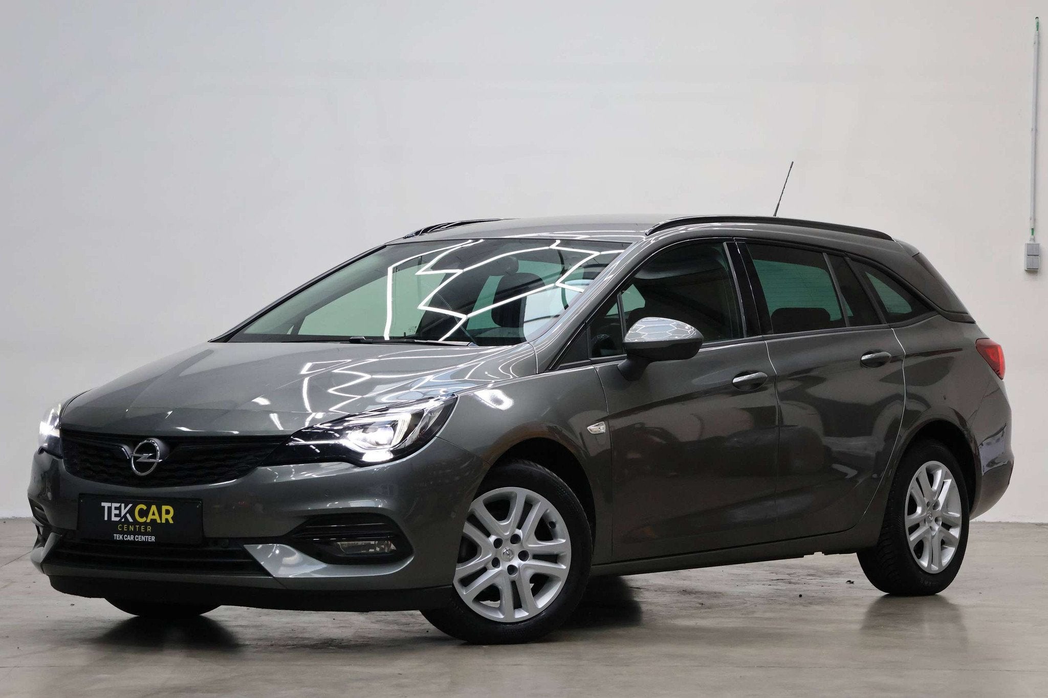 Opel Astra Sports Tourer 1.5D Automaat 12M Garantie, Autos, Argent ou Gris, Euro 6, Entreprise, Noir