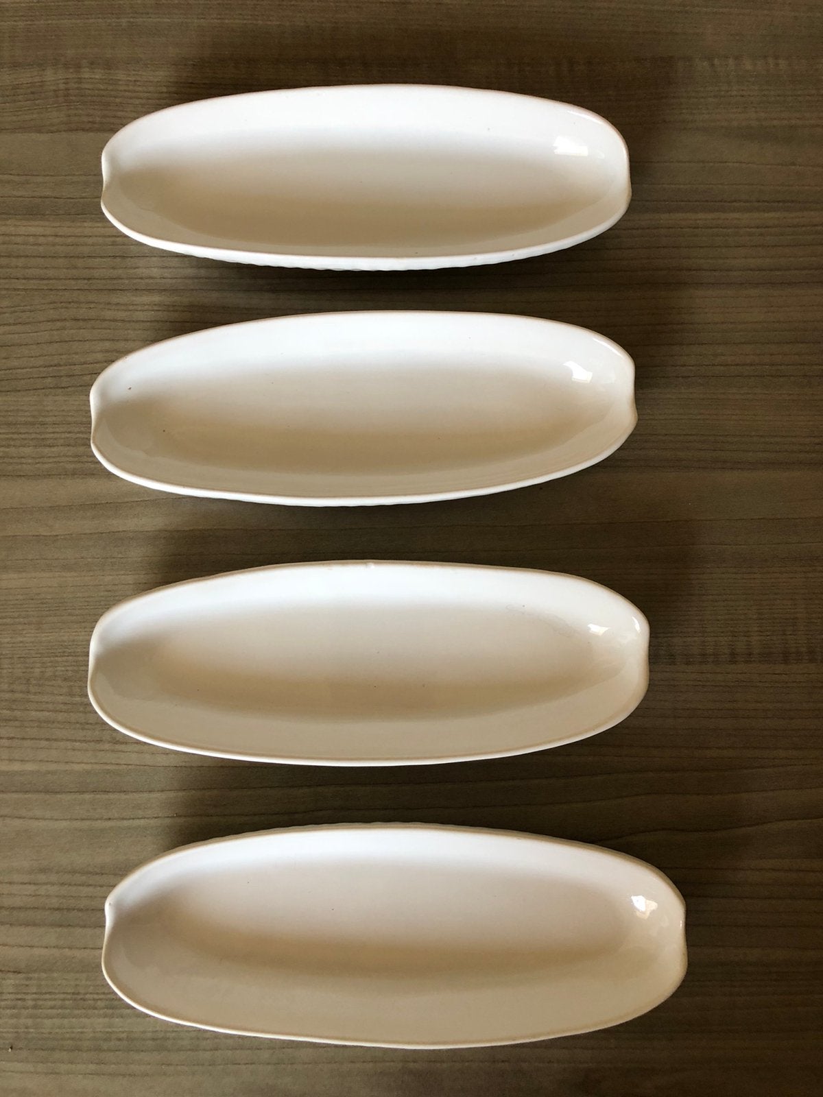 4 mais serveerbordjes., Ophalen