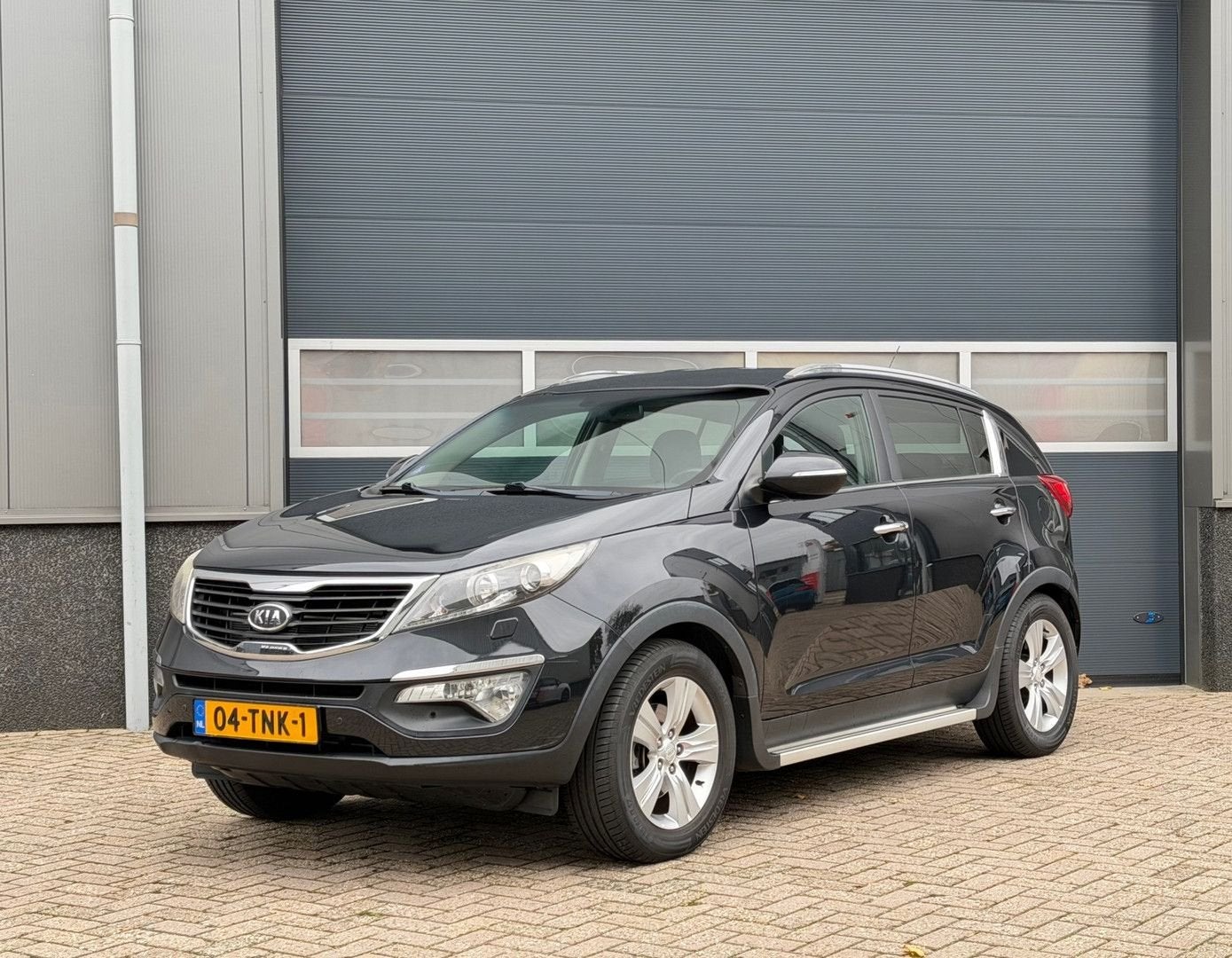 Kia Sportage 1.6 GDI ISG X-clusive bj.2012 Leder|Navi|NL aut, Autos, Achat, 149 g/km, Noir, Essence