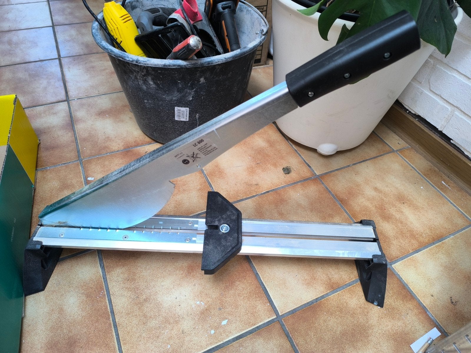 laminaat snijder, Ophalen