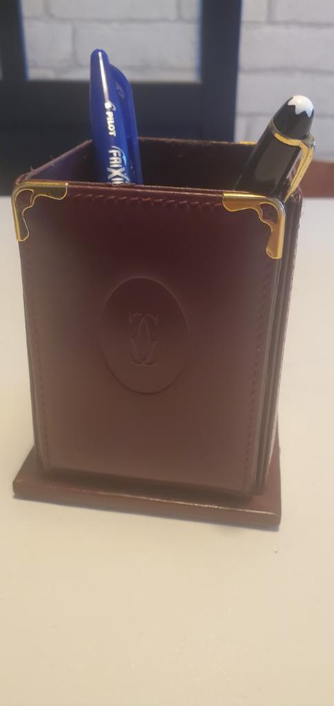 cartier pot a crayon, Envoi