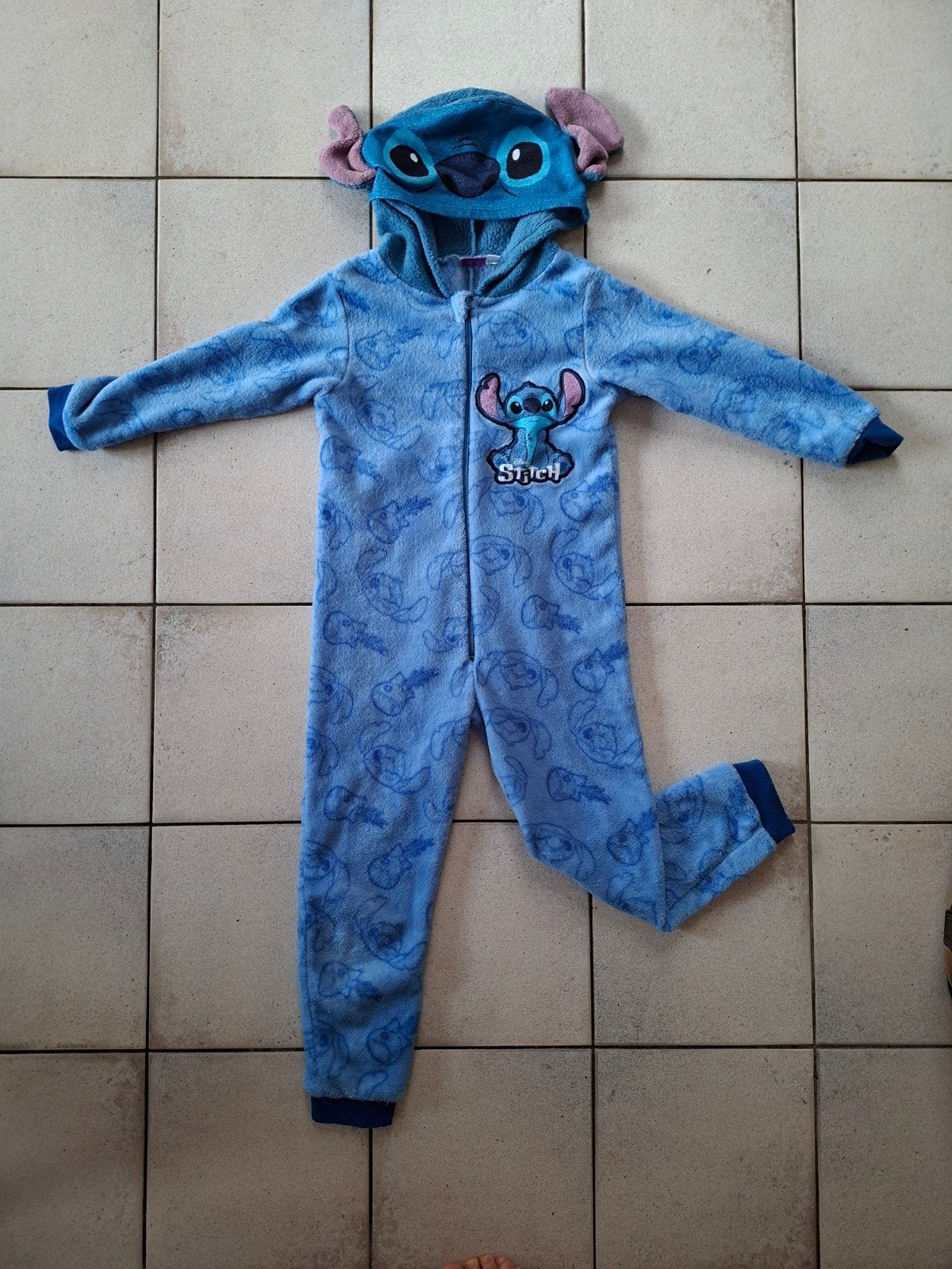 Stitch onesie maat 122/128, Kinderen en Baby's, Ophalen of Verzenden, Zo goed als nieuw, Jongen of Meisje