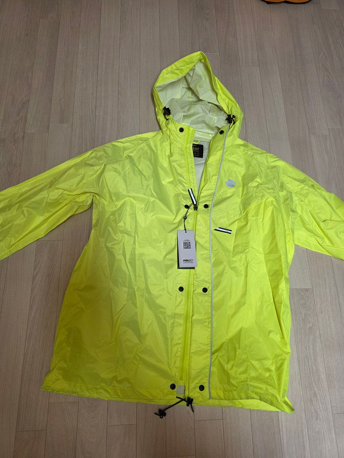 fluo regenjas AGU maat xl met etiket., Fietsen en Brommers, Ophalen of Verzenden, XL