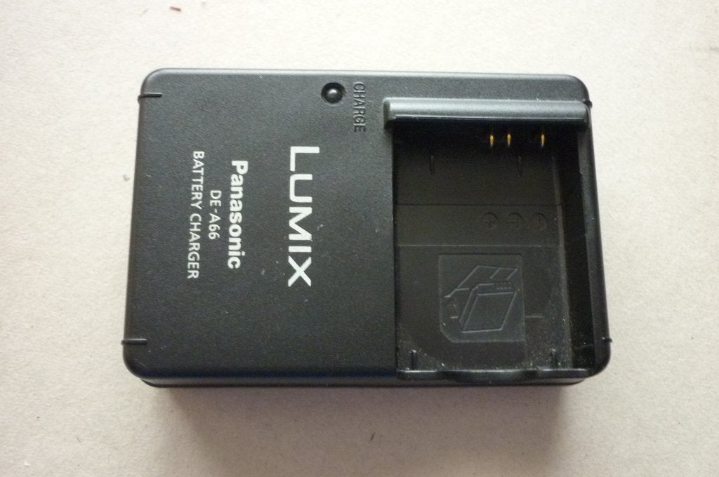 lader panasonic DE-A66, Panasonic, Gebruikt, Acculader, Opladen via netstroom