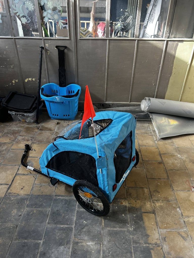 Fietskar / aanhangwagen voor kind of hond – blauw, Enlèvement