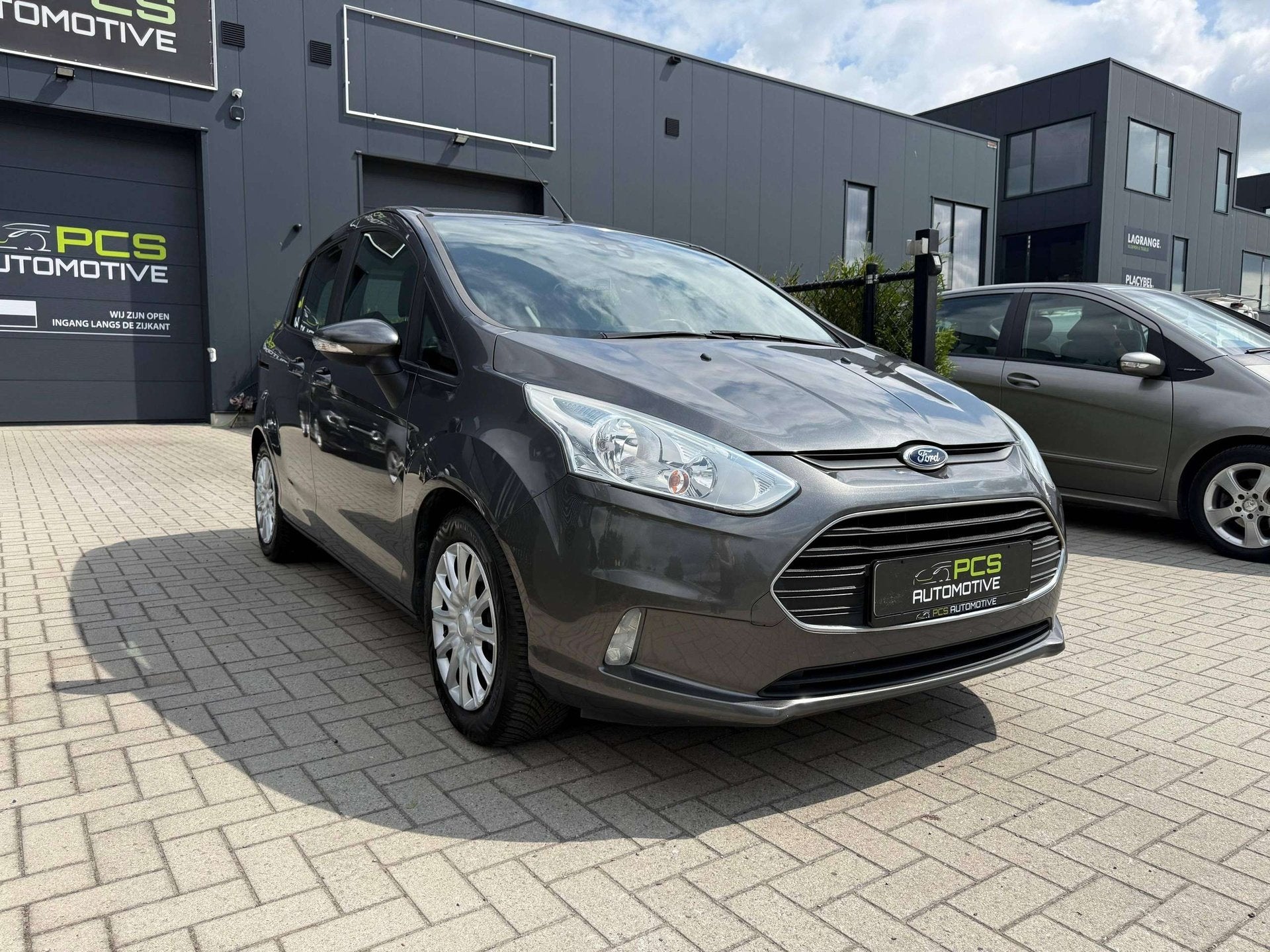 Ford B-Max 1.0 Benzine / 125 pk / 115.000 km / 12 mnd Waarbo, Auto's, Euro 5, Stof, Gebruikt, Zwart