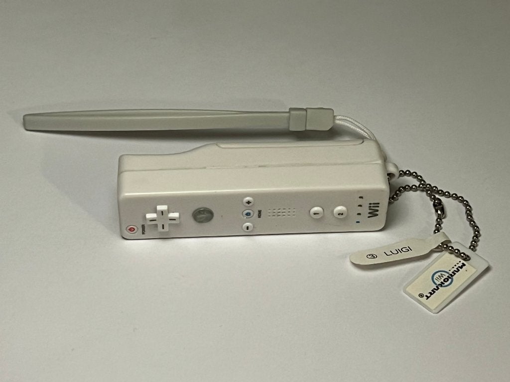 Porte-clés projecteur Wiimote Mario Kart Wii (2008), Verzamelen, Sleutelhangers, Gebruikt, Merk, Ophalen of Verzenden
