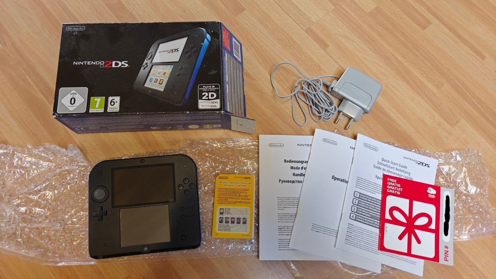 Nintendo 2DS complète dans un coffret + 14 jeux, Consoles de jeu & Jeux vidéo, Enlèvement ou Envoi, 2DS, Comme neuf, Avec jeux
