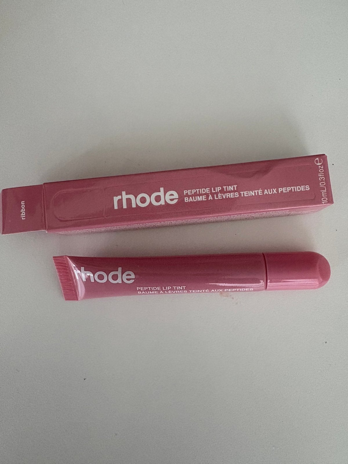 Lot de 2 gloss rhode neuf, Handtassen en Accessoires, Uiterlijk | Cosmetica en Make-up, Ophalen, Zo goed als nieuw