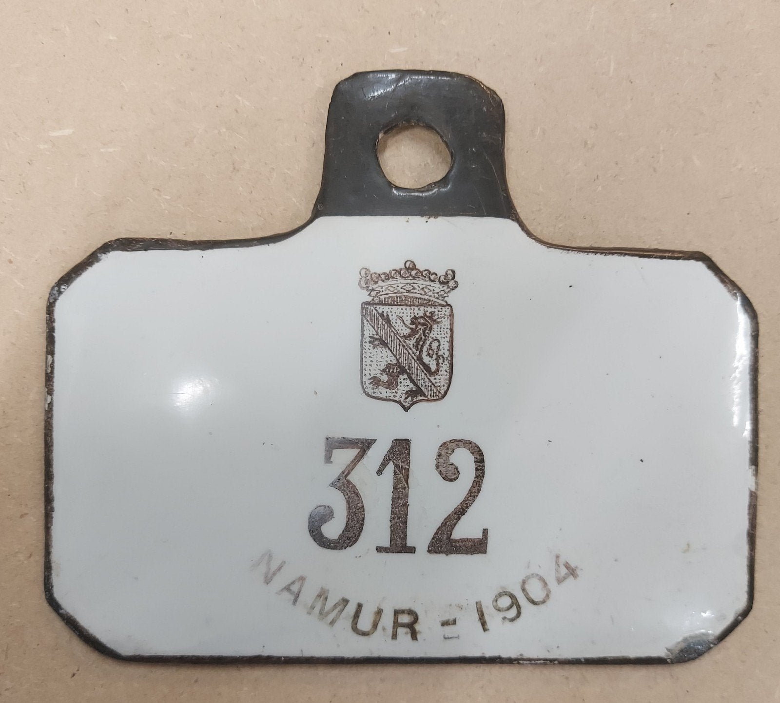Plaque de taxe moto 1904 Namur, Collections