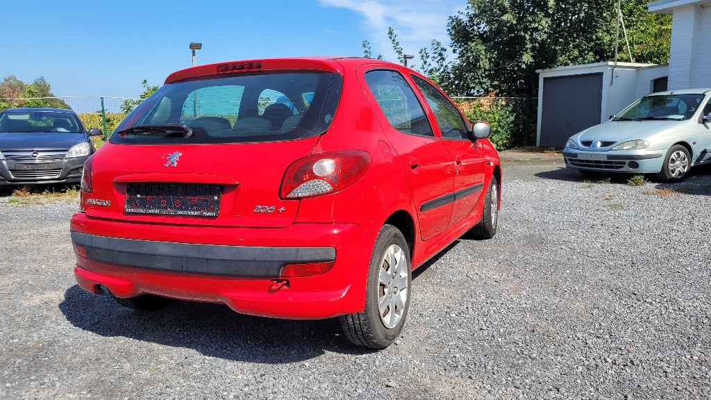 peugeot 206+ 1.1i AIRCO 5 deurs euro 4 2009, Rouge, Achat, Système audio, Entreprise