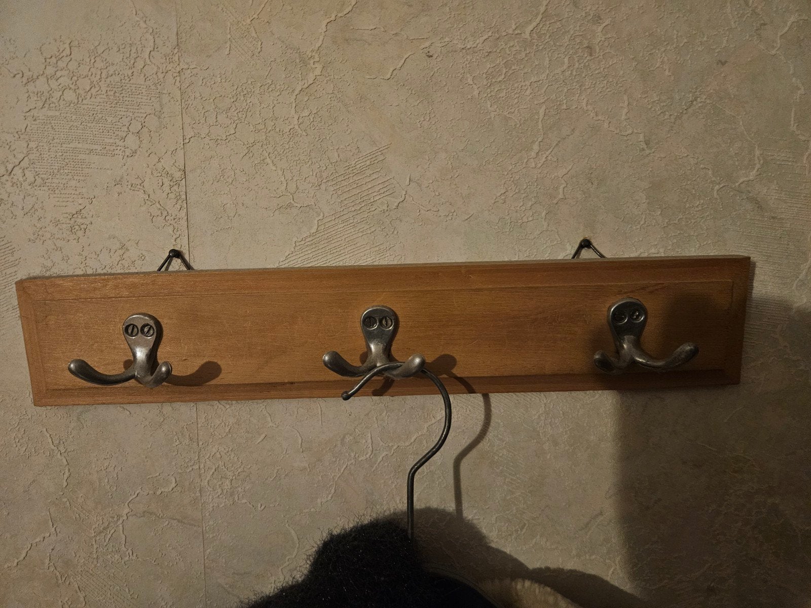 porte-manteau, Enlèvement