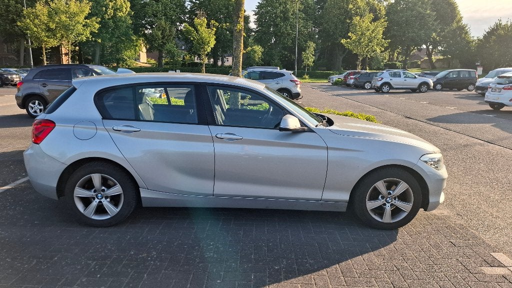 BMW 116i benzine 2016, Euro 6, 4 cilinders, Particulier, Zilver of Grijs