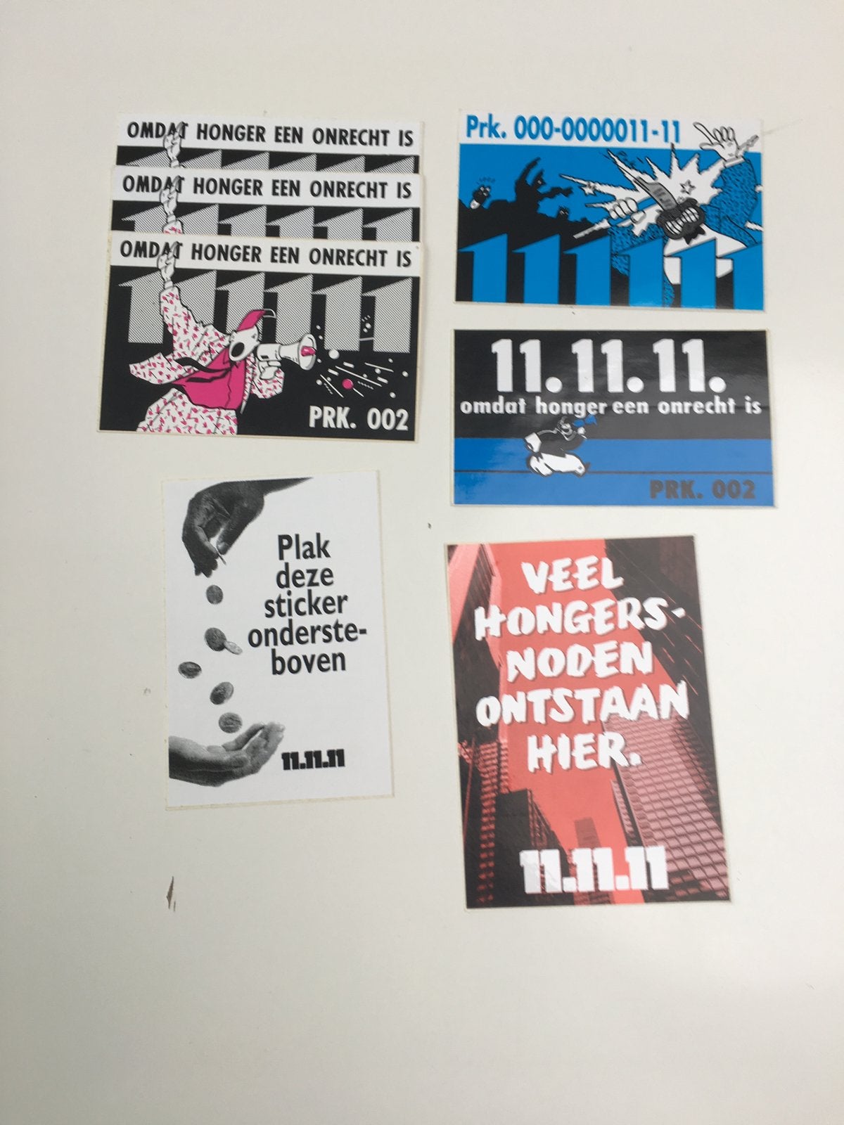 Sticker uit de reeks 11 11 11 - omdat honger onrecht, Ophalen of Verzenden, Nieuw, Bedrijf of Vereniging