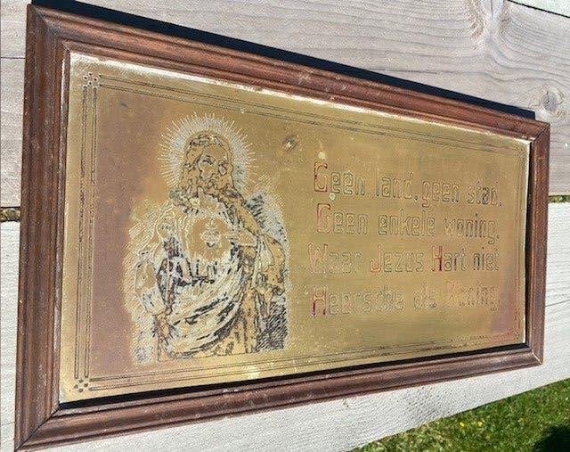 Antieke wandplaat met religieuze tekst, Ophalen