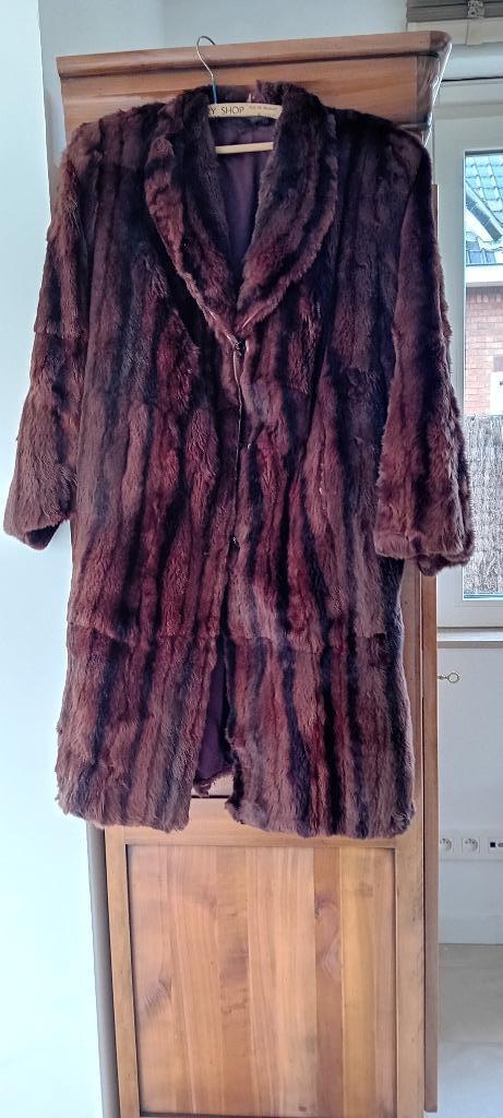 Manteau en fourrure, Enlèvement, Porté