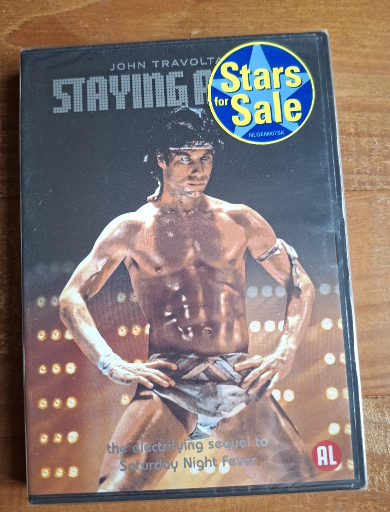 Staying alive - John Travolta, Enlèvement ou Envoi, Neuf, dans son emballage, Autres genres