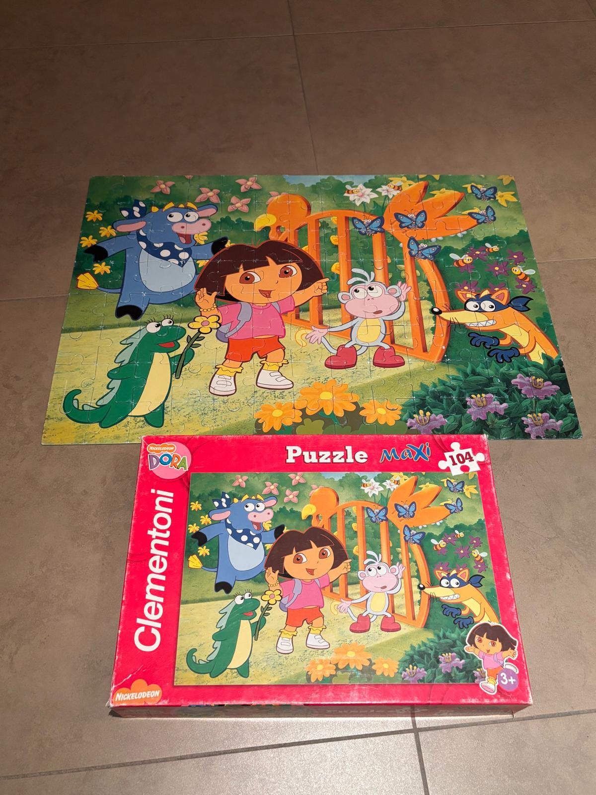 2 Dora puzzels samen voor 7 euro, Ophalen, Zo goed als nieuw
