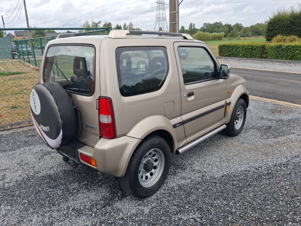 suzuki jimny #4x4# 1300cc benzine !!nieuwstaat!! 92 000km, Auto's, 4 zetels, Stof, Zwart, Bedrijf