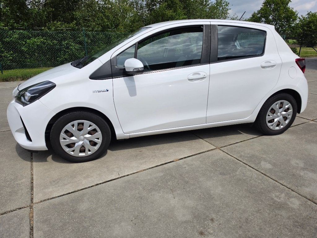 Toyota Yaris 1.5 Hybrid Comfort Navi 37.000 km + Garantie, Auto's, Automaat, 1497 cc, Navigatiesysteem, Wit