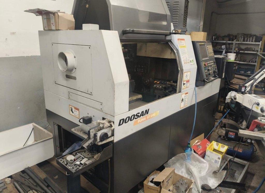 DOOSAN Pma ST 200 Swiss-type langsdraaiautomaat, Ophalen