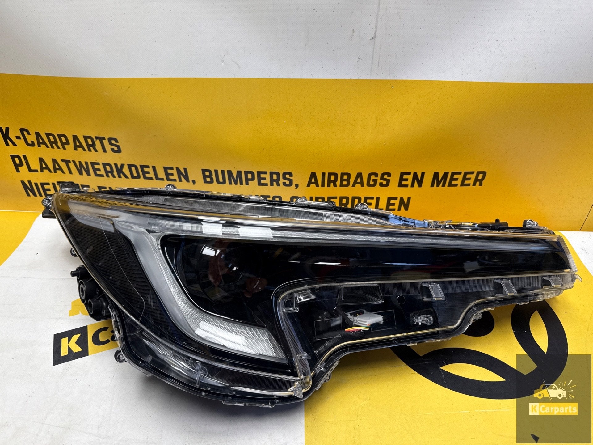TOYOTA COROLLA E21 Facelift Koplamp Rechts 22- 81150-02X10, Info@fabrikant.eu, Fabrikantstraat 1
1000 AA  Amsterdam, NL, Toyota