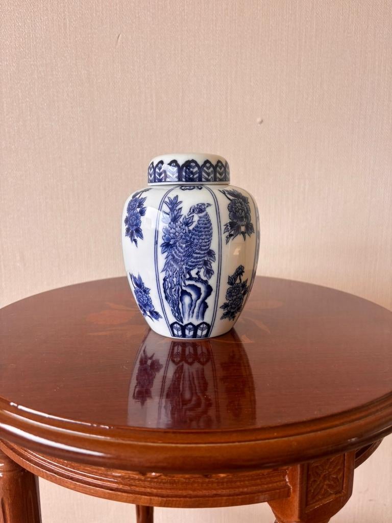Delfts blauwe vaas, Ophalen