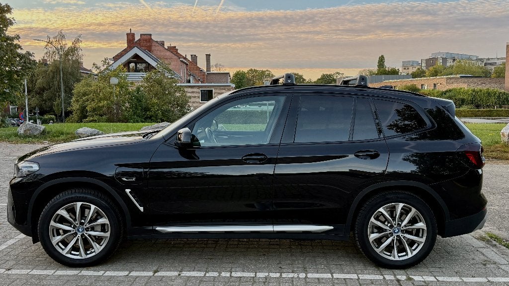 BMW X3 xDrive30e M Sport | 2022 | 87.975 km | PHEV, Autos, 215 kW, Achat, Entretenue par le concessionnaire, Noir