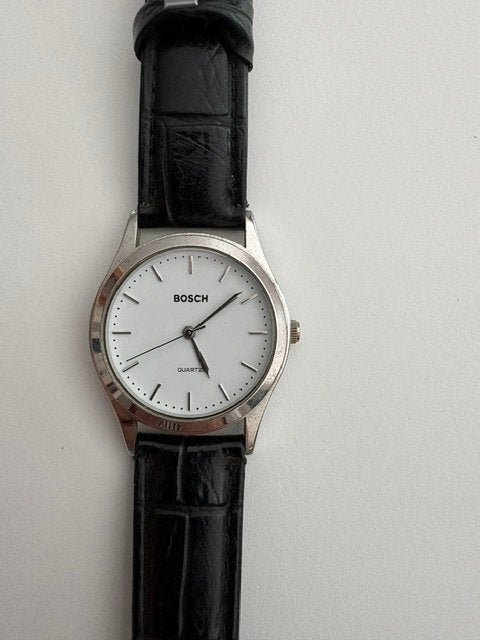 Montre publicitaire BOSCH avec nouvelle pile, Handtassen en Accessoires, Horloges | Heren, Ophalen, Leer, Polshorloge, Zo goed als nieuw