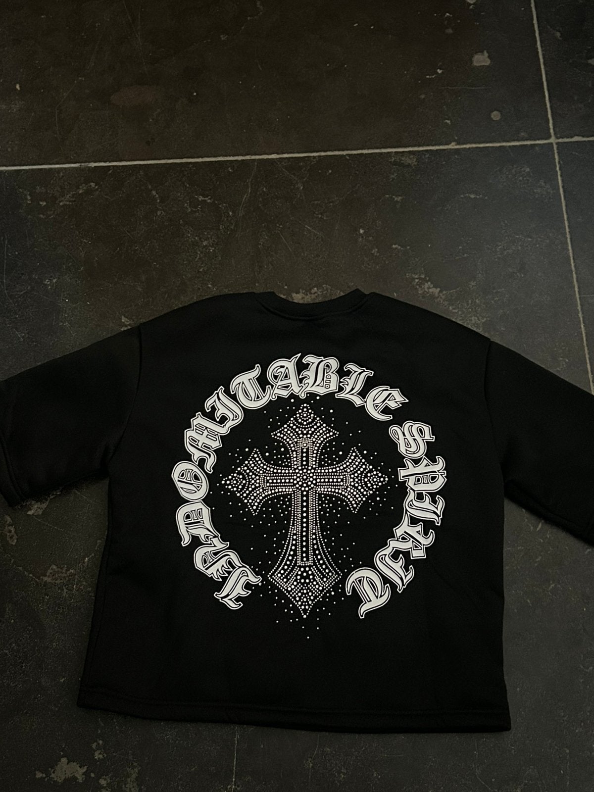 Zwarte tshirt diamond cross, Ophalen of Verzenden, Zo goed als nieuw, Maat 48/50 (M)