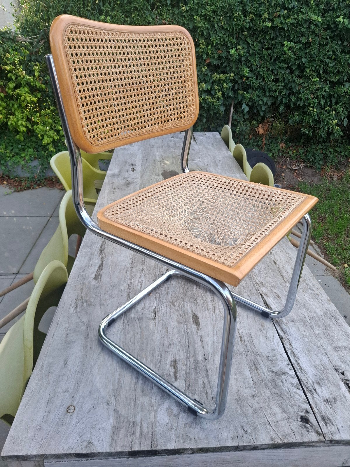 vintage rotan stoel met buisframe, Huis en Inrichting, Ophalen, Gebruikt, Vintage, Riet of Rotan