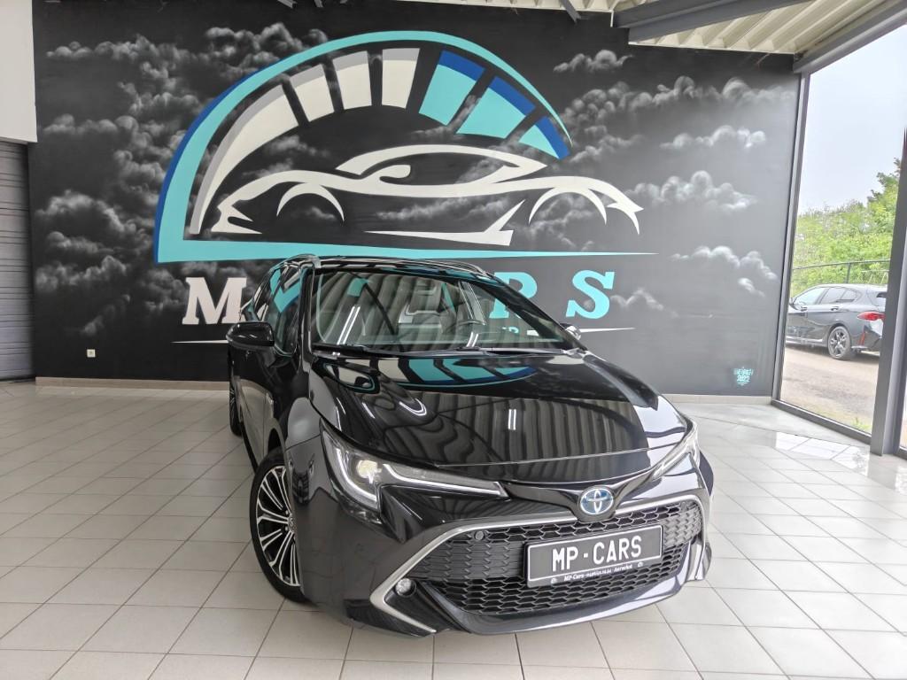 Toyota Corolla Corolla SW Hybrid 1.8 Premium e-CVT, Auto's, Toyota, Zwart, Break, 5 deurs, Parkeerassistent