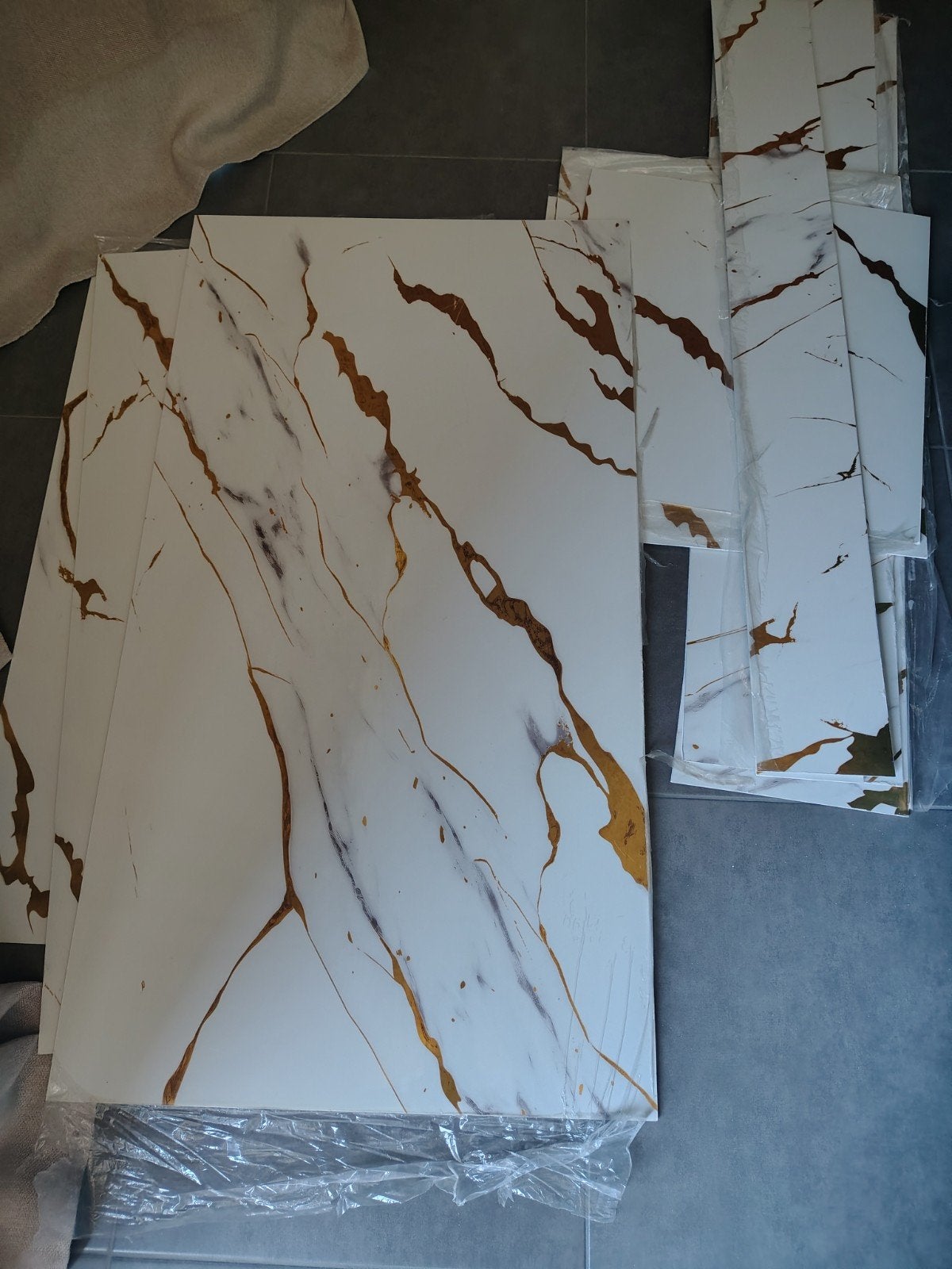 PVC marmer wandpanelen, Ophalen