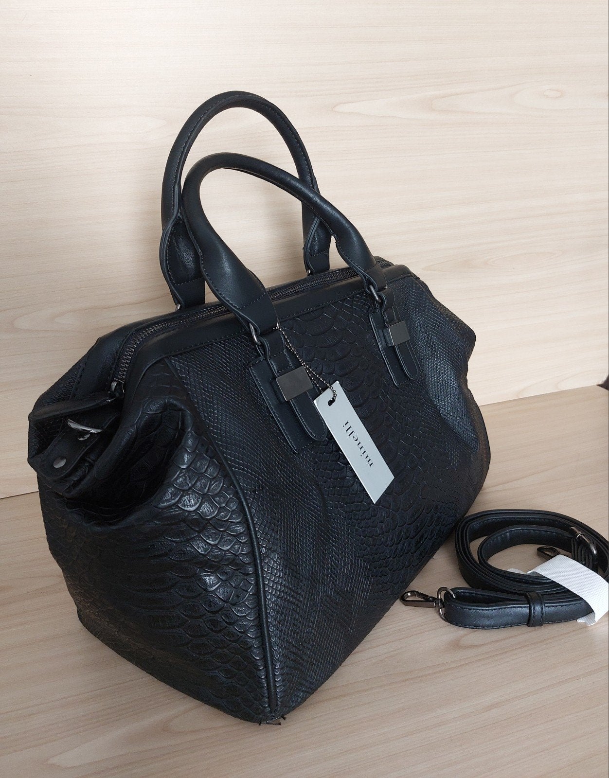 Sac femme neuf, Enlèvement