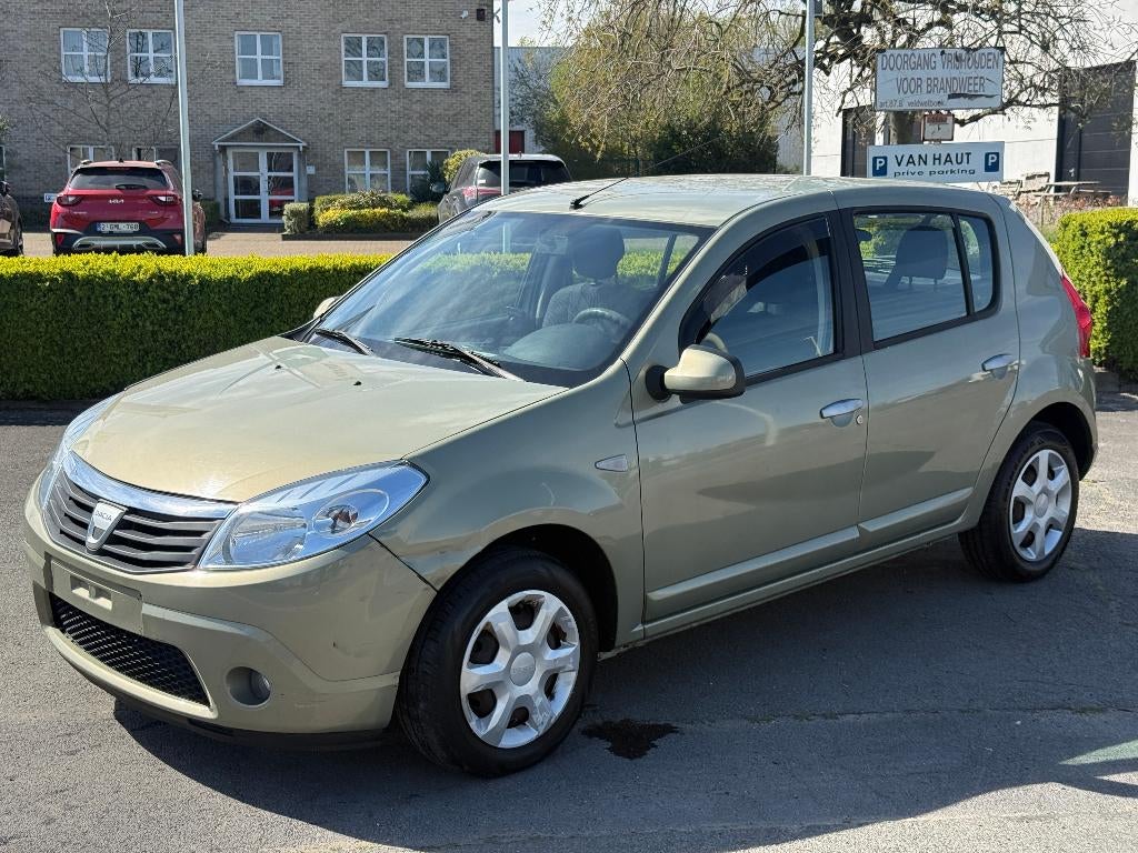 Dacia Sandero 1.6 MPi Benzine met Airco, Auto's, Dacia, Voorwielaandrijving, Stof, Beige, Bedrijf