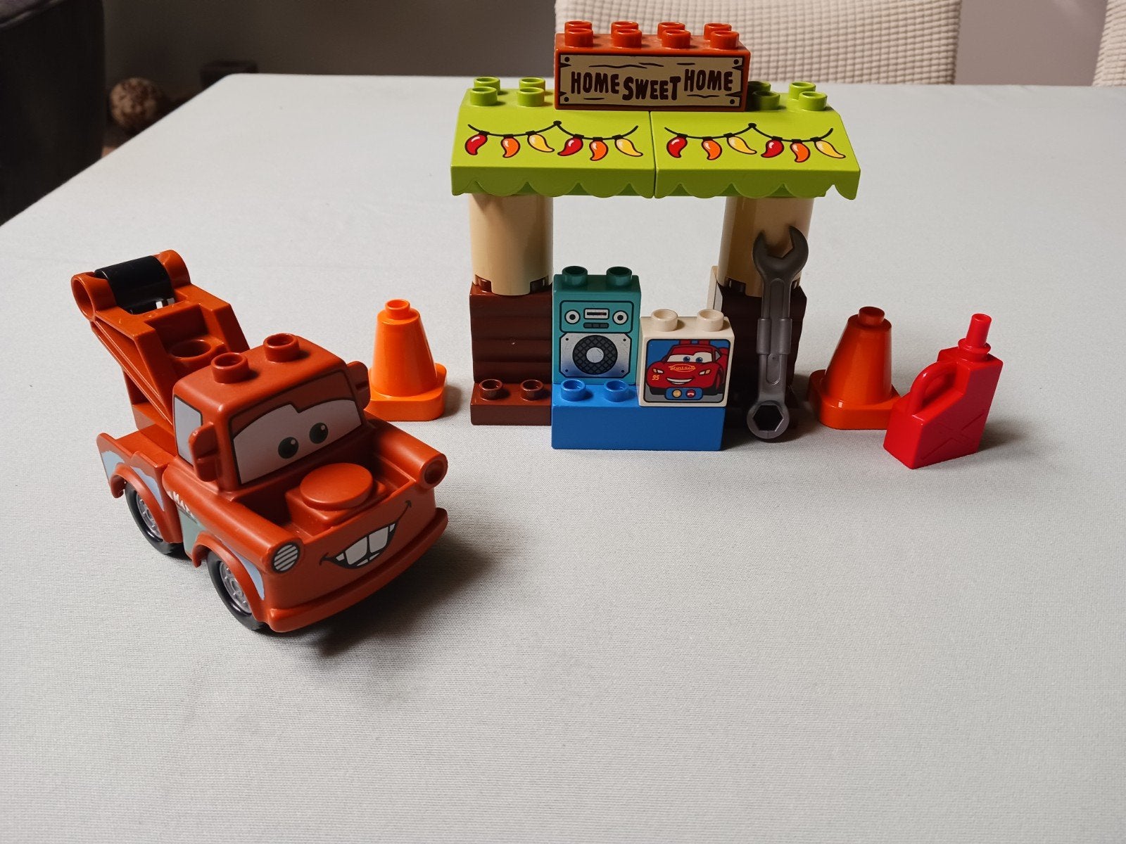 Duplo set 10856 'Takels schuur' (Tom Mater)., Kinderen en Baby's, Speelgoed | Duplo en Lego, Ophalen of Verzenden, Complete set
