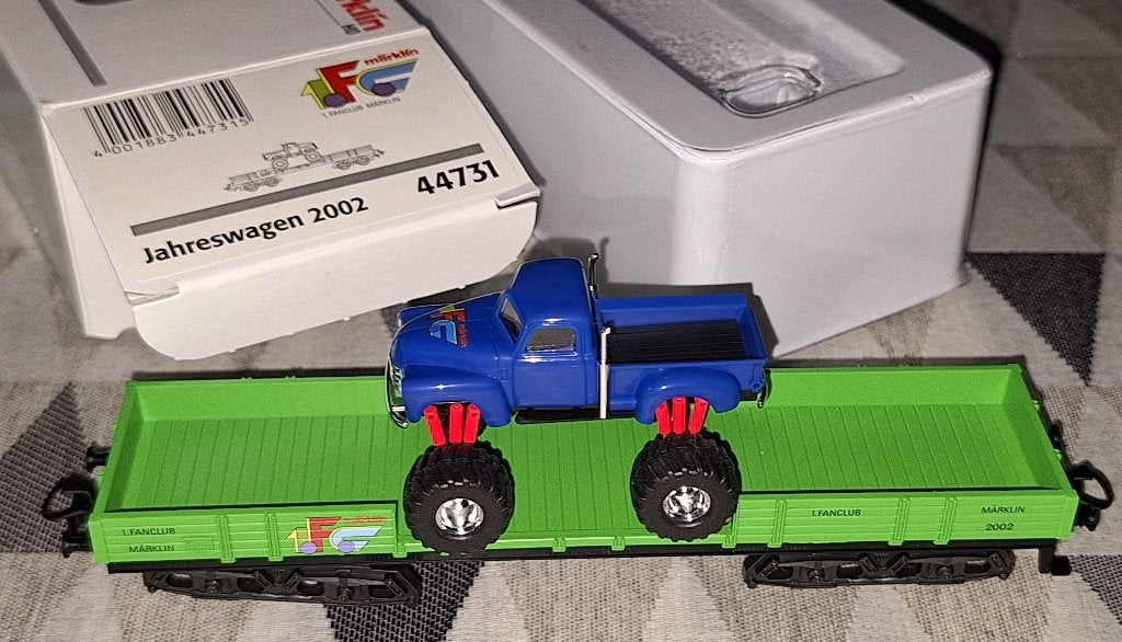Märklin HO 44731 lageboordwagen met monstertruck, Hobby en Vrije tijd, Ophalen of Verzenden, Zo goed als nieuw, Wagon, Märklin