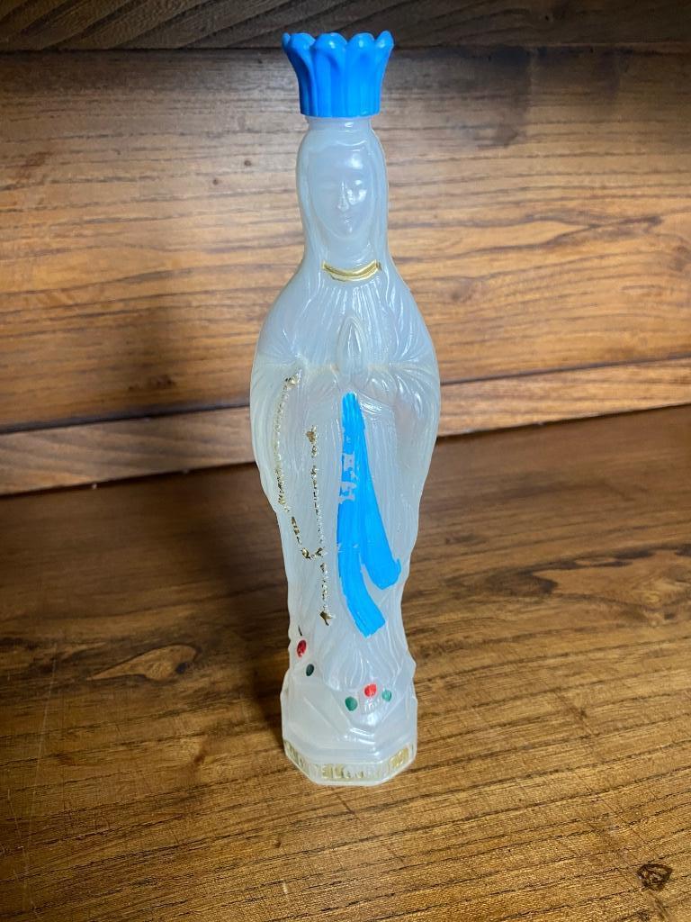 Oud wijwater flesje lourdes, Ophalen