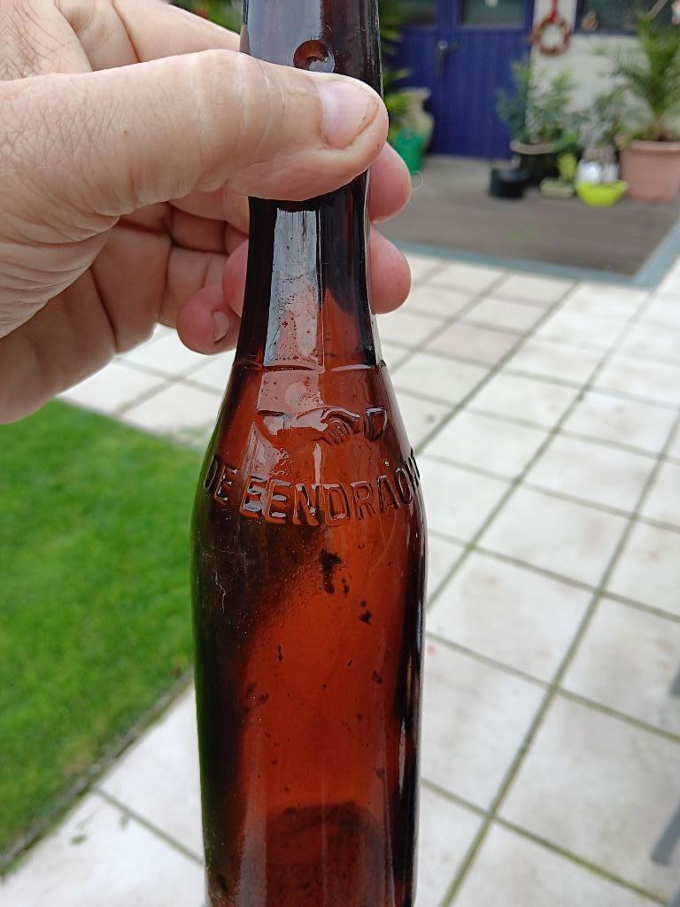 bierfles de eendracht en st jozef, Ophalen of Verzenden, Gebruikt, Flesje(s), Overige merken