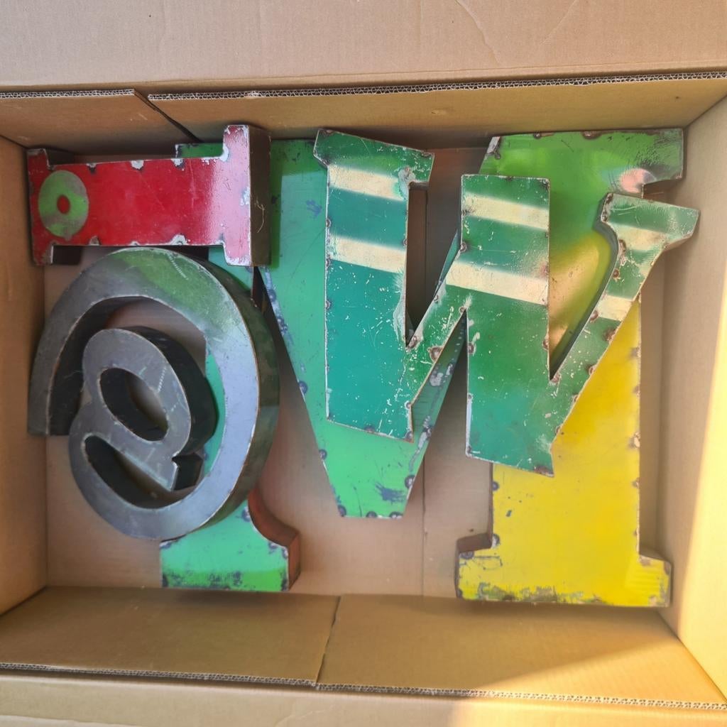 4 lettres en métal, Ophalen