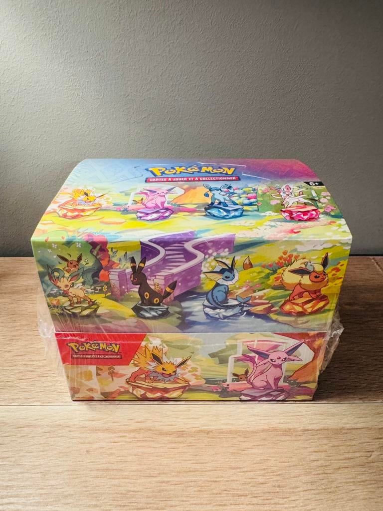 NEUVE - Display Mini Tins Évolutions Prismatiques EV8.5, Enlèvement ou Envoi, Neuf, Booster box