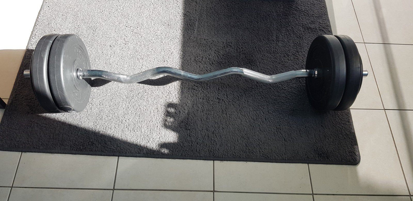 curl bar +4x5kg  2x2,5 kg, Ophalen of Verzenden