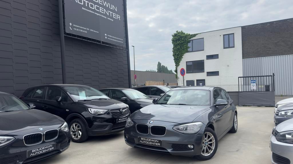 Bmw 1 Serie 1.6Benzine AUTOMAAT 2011 170.xxxkm Topstaat, Auto's, BMW, Automaat, Zwart, 5 deurs, https://public.car-pass.be/vhr/61240180-234f-4c4d-94f5-52f9d5f55593