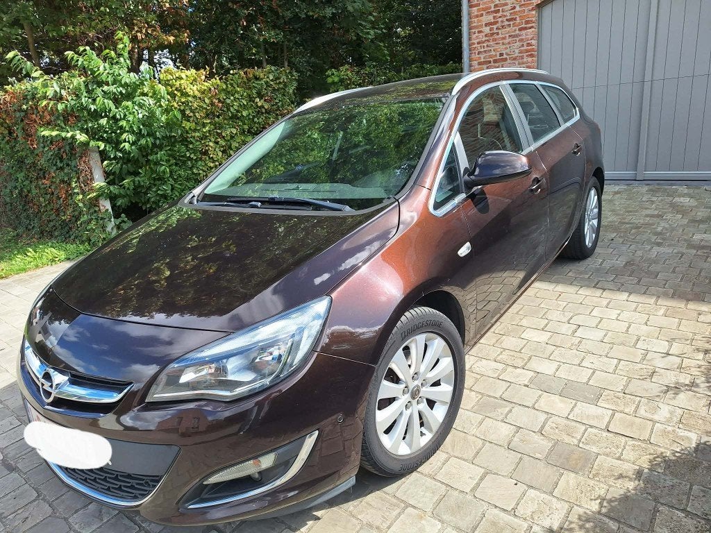 Opel Astra Sports Tourer 1.6 Cdti 136pk trekhaak Euro6B, Auto's, 100 kW, USB, 1600 cc, Leder en Stof